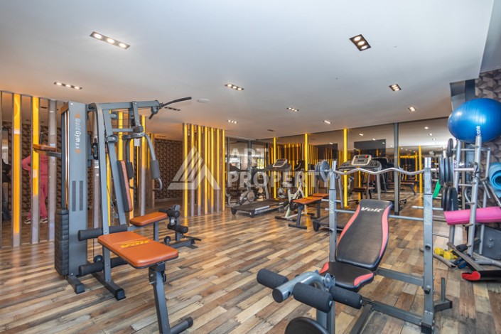 Стильная квартира 1+1 в Махмутларе в комплексе индивидуальным архитектурным дизайном в 250 метрах от моря - Ракурс 23