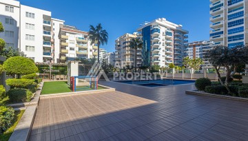 Стильная квартира 1+1 в Махмутларе в комплексе индивидуальным архитектурным дизайном в 250 метрах от моря - Ракурс 25