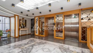 Стильная квартира 1+1 в Махмутларе в комплексе индивидуальным архитектурным дизайном в 250 метрах от моря - Ракурс 27