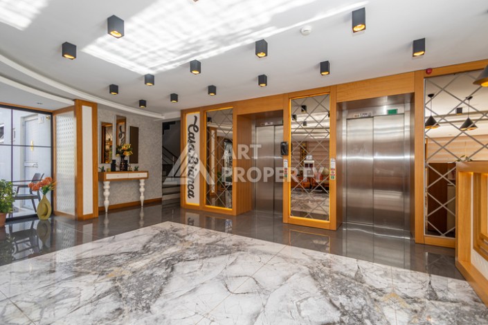 Стильная квартира 1+1 в Махмутларе в комплексе индивидуальным архитектурным дизайном в 250 метрах от моря - Ракурс 26