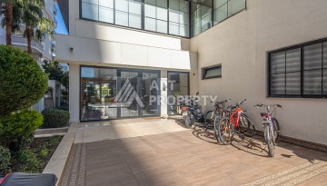 Стильная квартира 1+1 в Махмутларе в комплексе индивидуальным архитектурным дизайном в 250 метрах от моря - Ракурс 28