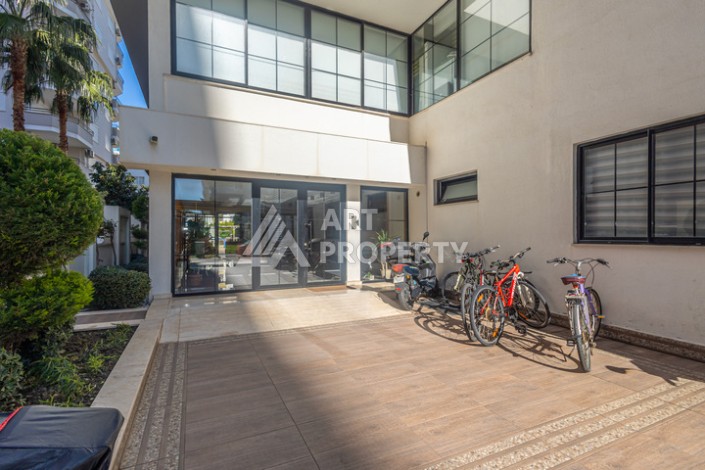 Стильная квартира 1+1 в Махмутларе в комплексе индивидуальным архитектурным дизайном в 250 метрах от моря - Ракурс 27