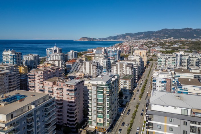 Стильная квартира 1+1 в Махмутларе в комплексе индивидуальным архитектурным дизайном в 250 метрах от моря - Ракурс 28