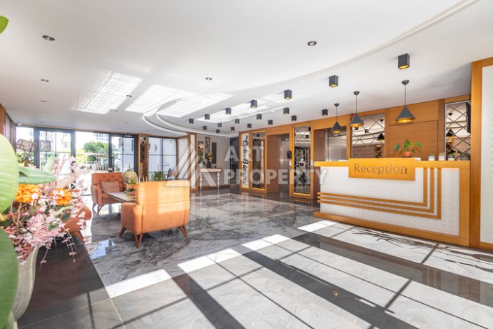 Стильная квартира 1+1 в Махмутларе в комплексе индивидуальным архитектурным дизайном в 250 метрах от моря - Ракурс 29