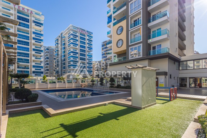 Стильная квартира 1+1 в Махмутларе в комплексе индивидуальным архитектурным дизайном в 250 метрах от моря - Ракурс 30