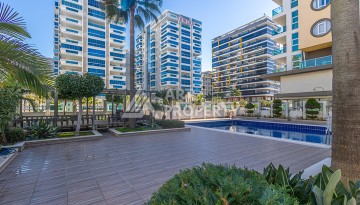 Стильная квартира 1+1 в Махмутларе в комплексе индивидуальным архитектурным дизайном в 250 метрах от моря - Ракурс 32