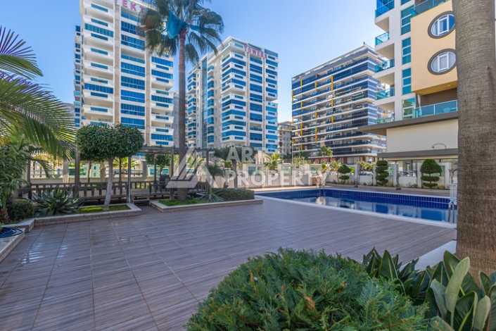 Стильная квартира 1+1 в Махмутларе в комплексе индивидуальным архитектурным дизайном в 250 метрах от моря - Ракурс 31