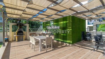 Стильная квартира 1+1 в Махмутларе в комплексе индивидуальным архитектурным дизайном в 250 метрах от моря - Ракурс 33