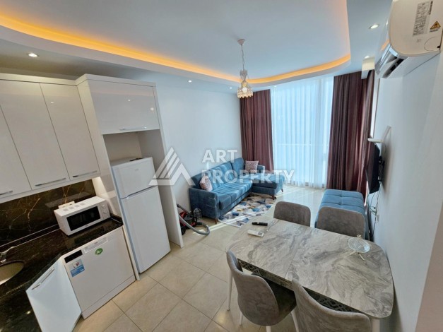 Двухкомнатная квартира 60 кв.м. в престижной резиденции. Махмутлар, Алания - Ракурс 1