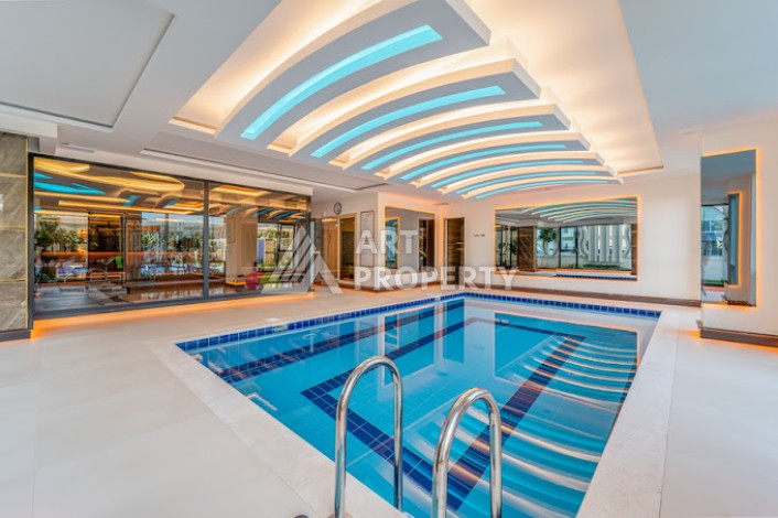 Двухкомнатная квартира 60 кв.м. в престижной резиденции. Махмутлар, Алания - Ракурс 2