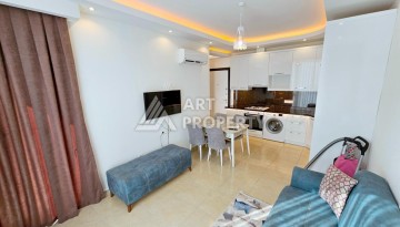 Двухкомнатная квартира 60 кв.м. в престижной резиденции. Махмутлар, Алания - Ракурс 4