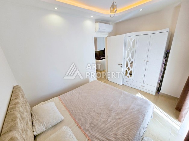 Двухкомнатная квартира 60 кв.м. в престижной резиденции. Махмутлар, Алания - Ракурс 4