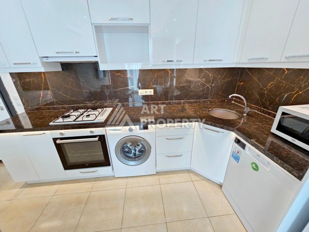 Двухкомнатная квартира 60 кв.м. в престижной резиденции. Махмутлар, Алания - Ракурс 9