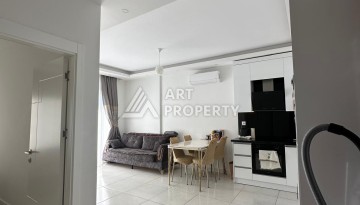 Стильная квартира 1+1 в новом комплексе 2022 года в Махмутларе, 700 м до моря - Ракурс 3