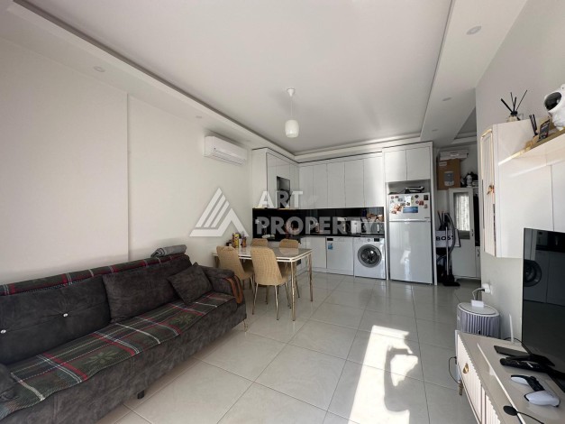 Стильная квартира 1+1 в новом комплексе 2022 года в Махмутларе, 700 м до моря - Ракурс 7