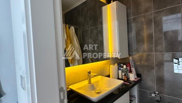 Стильная квартира 1+1 в новом комплексе 2022 года в Махмутларе, 700 м до моря - Ракурс 12