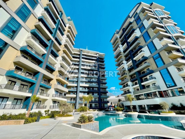 Стильная квартира 1+1 в новом комплексе 2022 года в Махмутларе, 700 м до моря - Ракурс 26