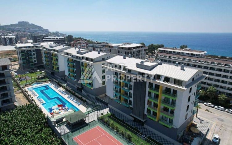 Меблированная квартира 1+1 в элитной резиденции в Каргыджаке, всего 100 м от моря - Ракурс 0