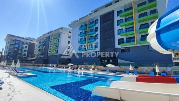 Меблированная квартира 1+1 в элитной резиденции в Каргыджаке, всего 100 м от моря - Ракурс 3