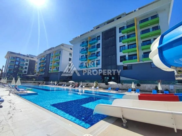 Меблированная квартира 1+1 в элитной резиденции в Каргыджаке, всего 100 м от моря - Ракурс 2