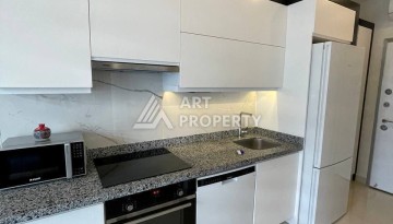 Меблированная квартира 1+1 в элитной резиденции в Каргыджаке, всего 100 м от моря - Ракурс 7