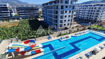 Меблированная квартира 1+1 в элитной резиденции в Каргыджаке, всего 100 м от моря - Ракурс 10