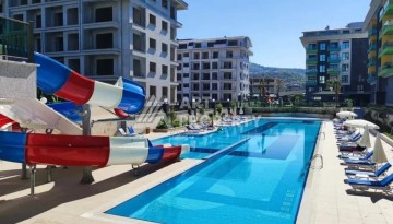 Меблированная квартира 1+1 в элитной резиденции в Каргыджаке, всего 100 м от моря - Ракурс 12