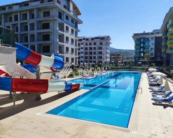 Меблированная квартира 1+1 в элитной резиденции в Каргыджаке, всего 100 м от моря - Ракурс 11