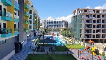 Меблированная квартира 1+1 в элитной резиденции в Каргыджаке, всего 100 м от моря - Ракурс 16