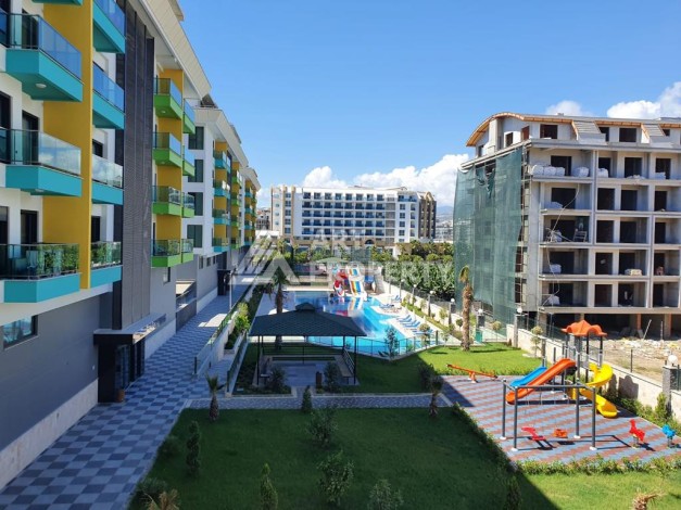 Меблированная квартира 1+1 в элитной резиденции в Каргыджаке, всего 100 м от моря - Ракурс 15