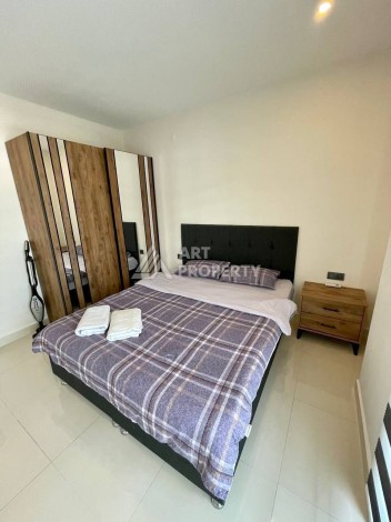 Меблированная квартира 1+1 в элитной резиденции в Каргыджаке, всего 100 м от моря - Ракурс 19