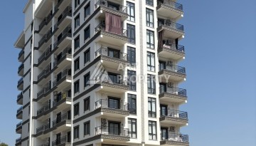 Квартира 1+1 в центре Махмутлара, 50 кв.м. - Ракурс 1