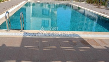 Квартира 1+1 в центре Махмутлара, 50 кв.м. - Ракурс 2