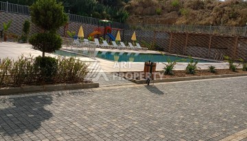 Квартира 1+1 в центре Махмутлара, 50 кв.м. - Ракурс 12