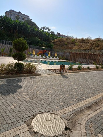 Квартира 1+1 в центре Махмутлара, 50 кв.м. - Ракурс 11