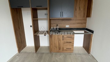 Квартира 1+1 в центре Махмутлара, 50 кв.м. - Ракурс 15