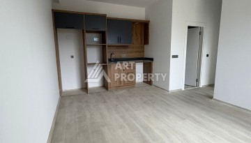 Квартира 1+1 в центре Махмутлара, 50 кв.м. - Ракурс 16