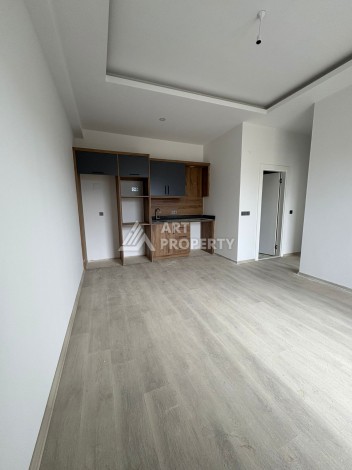 Квартира 1+1 в центре Махмутлара, 50 кв.м. - Ракурс 15