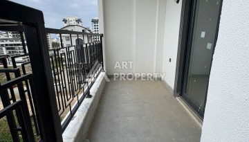 Квартира 1+1 в центре Махмутлара, 50 кв.м. - Ракурс 17