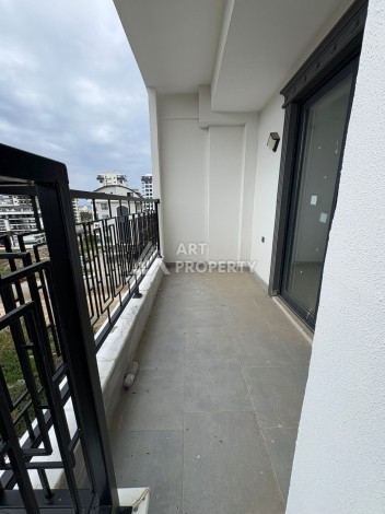 Квартира 1+1 в центре Махмутлара, 50 кв.м. - Ракурс 16