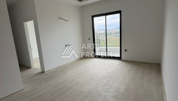 Квартира 1+1 в центре Махмутлара, 50 кв.м. - Ракурс 18