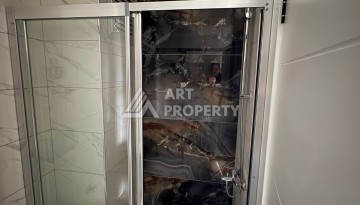 Квартира 1+1 в центре Махмутлара, 50 кв.м. - Ракурс 19