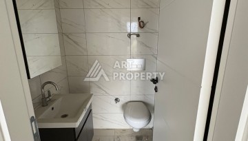 Квартира 1+1 в центре Махмутлара, 50 кв.м. - Ракурс 20