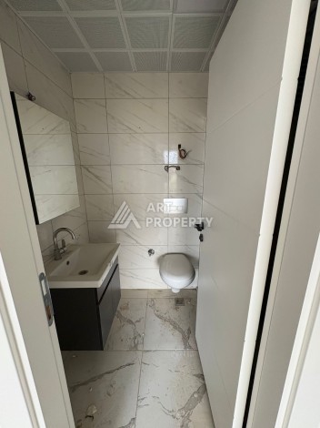 Квартира 1+1 в центре Махмутлара, 50 кв.м. - Ракурс 19