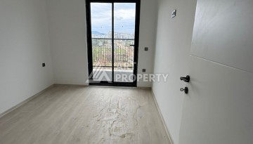 Квартира 1+1 в центре Махмутлара, 50 кв.м. - Ракурс 22