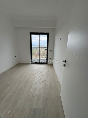 Квартира 1+1 в центре Махмутлара, 50 кв.м. - Ракурс 21