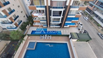 Квартира 1+1 на улице Барбаросса с боковым видом на море в Махмутларе, 55 кв.м. - Ракурс 3