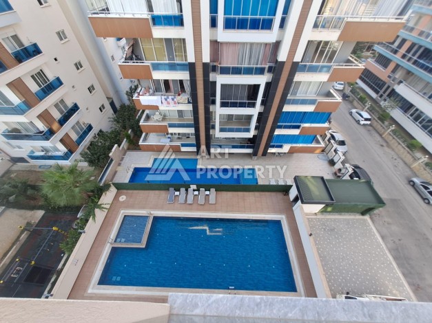 Квартира 1+1 на улице Барбаросса с боковым видом на море в Махмутларе, 55 кв.м. - Ракурс 2