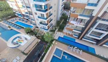 Квартира 1+1 на улице Барбаросса с боковым видом на море в Махмутларе, 55 кв.м. - Ракурс 7