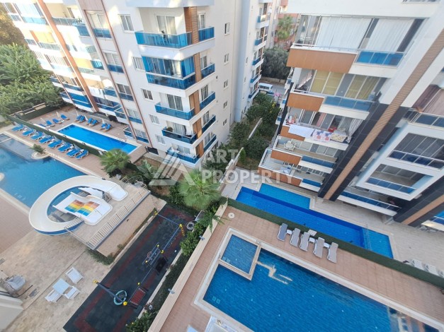 Квартира 1+1 на улице Барбаросса с боковым видом на море в Махмутларе, 55 кв.м. - Ракурс 6